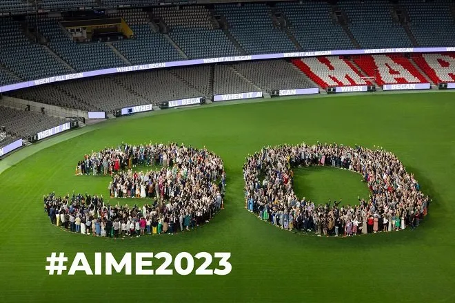 AIME 2023 celebrates 30 years with a human formation at Marvel Stadium, directed by SongDivision MCs.