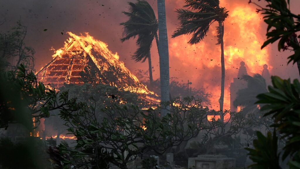 The hall of Waiola Church and nearby Lahaina Hongwanji Mission on fire on Maui, Hawaii.